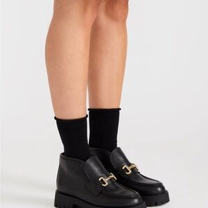 Black Leather Lug Sole Loafers with Gold Bit Detail